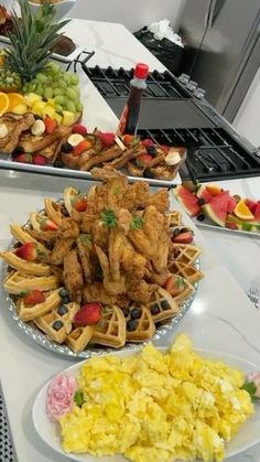 several plates of food on a kitchen counter