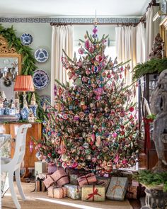 a decorated christmas tree in a living room