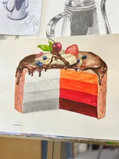 a piece of cake with fruit and chocolate on it