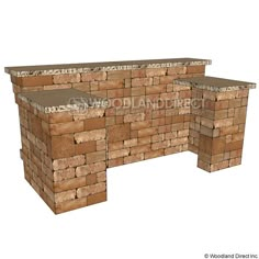 an outdoor fire pit made out of bricks