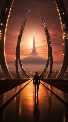 a man is walking in front of an alien like structure with the sun setting behind him