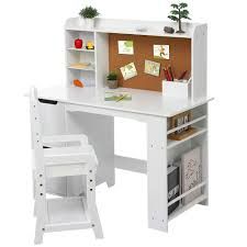 a white desk and chair with a corkboard on the wall behind it for children's play