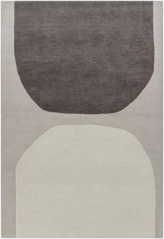 an area rug with various shapes and colors on it, including black, gray, white and grey