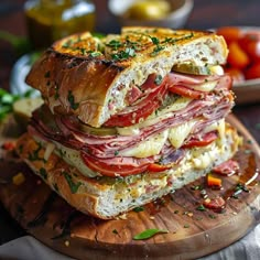 The Best Muffuletta Sandwich Recipe You'll Ever Try Muffaletta Sandwich Recipe, Hoggie Subs, Freeze Cheesecake, Freeze Cheese, Muffaletta Recipe, Muffaletta Sandwich, Muffuletta Sandwich, Weeknight Dinner Recipes, Best Sandwich Recipes