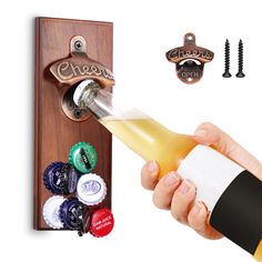 the bottle opener is open and there are several bottles in front of it, including one being filled with beer