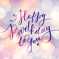 happy birthday to you lettering on blurry background