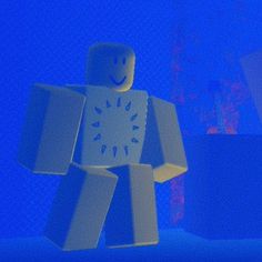 a lego man standing in front of a blue wall with a clock on it's face