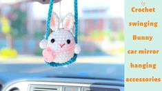 a crochet hanging bunny car mirror hanging decoration with the words, crochet swinging bunny car mirror hanging accessories