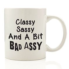 a white coffee mug that says classy sassy and a bit bad assy