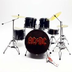 a drum set with the word ac dc on it