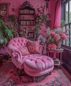 a living room with pink furniture and lots of flowers on the windows sills