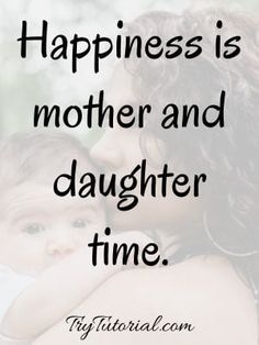 a woman holding a baby in her arms with the words happiness is mother and daughter time