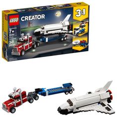 two legos are shown in front of the box and one has a space shuttle on it