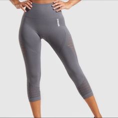 Power Your Performance With The Energy Seamless Leggings. Fully Functional And Fully Shape-Enhancing, These Gym Leggings Help You Through Cardio And Weights Alike With Support And Confidence. Take Care: This Product Is Delicate, So Please Take Appropriate Care When Wearing And Washing - High-Waisted Fit - Eyelet Detailing - Glute Contouring With Mesh Structures - Ribbed Waistband - Heat-Sealed Gymshark Logo To Hip And Back Waistband - 93% Nylon, 7% Elastane. Approximate Measurements: Waist Measu Gymshark Leggings, Gym Leggings, Seamless Leggings, Cropped Leggings, Cardio, Pant Jumpsuit, Gray Color, Capri, Tights