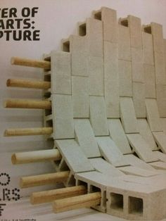 a magazine cover with a chair made out of blocks