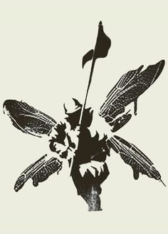 a black and white image of a flower with two flags sticking out of it's petals