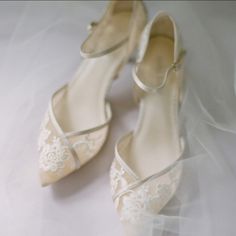 Bella Belle Size 7 Great Pre-Owned Condition, Some Wear To Bottom Sole Box Not Included Dust Bag Not Included Celia Lace D'orsay Nude Flats For Wedding Color: Nude Handmade Upper Material: Silk And Mesh Lining Material: Leather Lining Sole Material: Leather Sole Ankle Straps For A Secure Fit Wedding Bride Bridal Lace Feminine Elegant Rehearsal Dinner Engagement Photoshoot Formal Lace Wedding Shoes With Flat Heel, Elegant Lace Flat Heel Wedding Shoes, Elegant Lace Wedding Shoes With Flat Heel, Elegant Lace Flat Wedding Shoes, White Flat Heel Wedding Shoes, Fitted Flat Heel Wedding Shoes, Elegant Flat Heel Wedding Shoes For Bride, Champagne Closed Toe Wedding Shoes, Elegant Low Heel Wedding Shoes For Bride