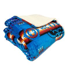 two blankets are stacked on top of each other, one is blue and the other is red