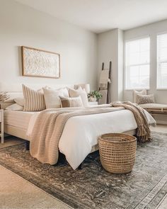 a large bed sitting in a bedroom on top of a rug