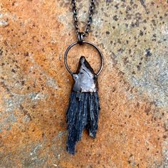 This copper electroformed piece features a large, raw Black Kyanite, turned into a witch's broom pendant! Perfect Halloween jewelry! This is the exact pendant that you will be receiving. The pendant measures approximately 3 inches tall and 1 inch wide. The antiqued copper chain measures 18 inches. Witch Broom Necklace, Black Kyanite, Witch Broom, Handcrafted Artisan Jewelry, Copper Chain, Halloween Jewelry, Sterling Silver Necklace Pendants, Copper Pendants, Silver Pendant Necklace