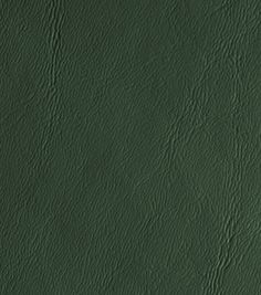 a green leather texture background or wallpaper