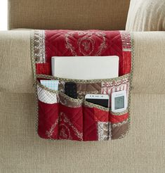 PRICES MAY VARY. 100% Polyester ORGANIZER WITH UNIQUE DESIGN: Burgundy floral and lace patchwork with heart love patterns, with double diamond quilting, elegant, exquisite and unique. Keep your accessories organized and protect your couch armrest against mess. Pets friendly. Made to enhance decor. DURABLE AND COMFORTABLE: Premium quality of quilted microfiber with extra soft fill, reverse to a white silicone puppy paw dots pattern, slip resistant and ECO friendly. Made to last. The silicone slip Couch Remote Holder, Patchwork Couch, Chair Organizer, Remote Caddy, Patchwork Sofa, Puppy Paw, Craft Fairs Booth, Remote Control Holder, Remote Holder