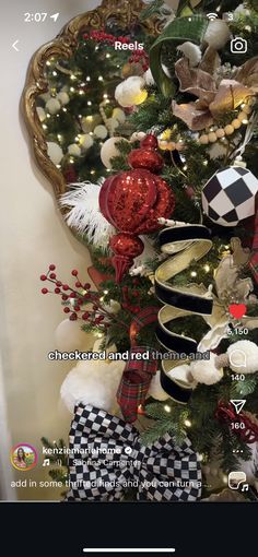 a decorated christmas tree with red, white and black decorations