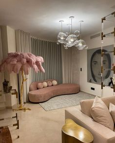 a living room filled with furniture and a large mirror on the wall above it's head