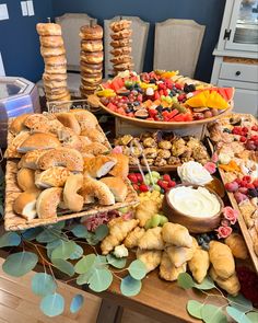 an assortment of breads and pastries on a table