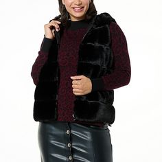 kathy ireland® Fashion 360 Bunny Hunny Reversible Faux Fur Vest Whether you're running errands around town or heading out for a winter hike, this vest is perfect for any occasion. Luxuriously soft and warm, the reversible design features a stylish faux fur on one side and a woven nylon fabric on the other, allowing you to switch up your look with ease. Wear it layered over your favorite sweater and jeans, or dressed up with a pencil skirt and boots for a night out on the town. Pencil Skirt And Boots, Ireland Fashion, Winter Hike, Sweater And Jeans, Skirt And Boots, Faux Fur Vest Black, Kathy Ireland, Reversible Vest, Faux Fur Vest