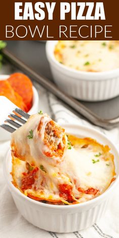 two bowls filled with lasagna casserole on top of a table