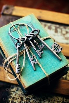 a bunch of keys that are on top of a book