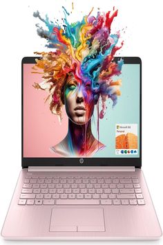 the hp envy laptop is open and has colorful hair on it's head, as well as an image of a woman