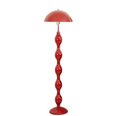 a red floor lamp with an orange shade on the top and bottom, in front of a white background