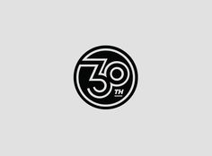 a black and white logo with the number thirty five in it's center circle