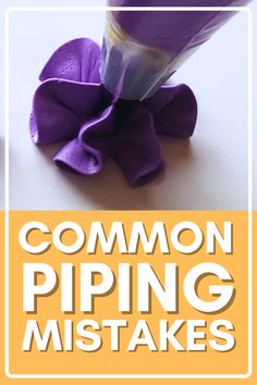 a purple flower sitting on top of a white table next to a yellow sign that says common piping makes