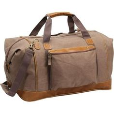 This eye-catching, 12 oz. stonewashed canvas duffle is fully lined and highlighted with rich faux leather trim. Its the perfect companion for any style conscious traveler. Combining fashion with function, the main compartment features a wide mouth opening, with popper side tabs that compliment its curves. Additional features include a front zip pocket for small items, a webbing loop in the back that allows the duffle to fit securely over a luggage handle, and 4 brass metal feet at the bottom to Best Sandals For Men, Rolling Duffle Bag, Canvas Duffel Bag, Best Shoes For Men, Travel Tote Bag, Travel Duffel, Duffel Bag Travel