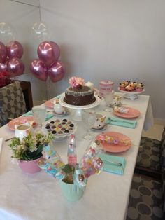 a table set up for a birthday party