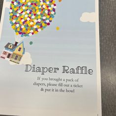 an advertisement for diaper raffle with a house and balloons floating in the sky