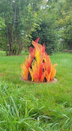 Orange, red and yellow flames with fake logs on a 20x20x20 campfire.
Order at ImaginarySusan.com. Pretend Campfire, Fake Campfire, Percy Jackson Party, Camp Vbs, Fake Fire, Fire Crafts, Glowing Embers, Indoor Camping, Vbs Themes