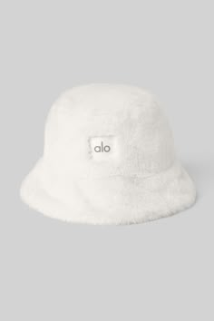 Lightweight. Super-soft. Street-ready. The Faux Fur Bucket Hat is the perfect choice for warming winter headwear in an on-trend bucket hat silhouette. Male Wardrobe, Hat Silhouette, Fuzzy Bucket Hat, White Bucket Hat, Winter Headwear, Gym Bag Essentials, Fur Bucket, Faux Fur Bucket Hat, Fur Bucket Hat