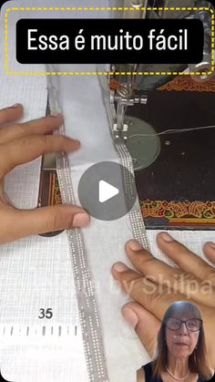 a video demonstrating how to sew on the sewing machine with hands and feet in front of it