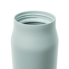 a close up of a blue vase on a white background