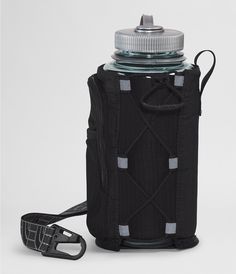 a black water bottle with a carafe attached to the top and strap around it