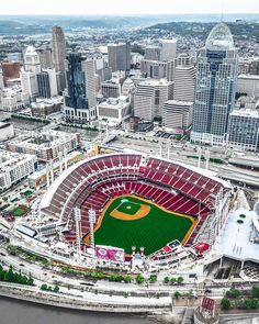 an aerial view of a baseball stadium in the city