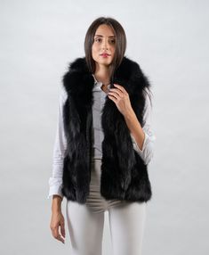 Made using 100% authentic fur, sourced from certified European fur auctions Made in Greece by AskioFashion furs Shell or outer :Black Blue Fox Inner Fabric:Polyester Satin Measurements from size:40eu/in us -10 Length:62 cm  bust-92cm Length:24.4 inches bust-36.22  inches Model is Wearing a size: Height-1,80cmBust-85cmWaist-65cmHips-95cm Mede to measure in every size, we accept customization For sizes XXL and XXXL, price of the coat is 10% and 20% higher Luxury Black Fur Coat With Feather Trim, Black Fur Vest, Handmade Vest, Fox Fur Vest, Black Fox, Vest Outfits, Fur Fashion, Polyester Satin, Fur Vest