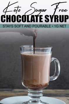 chocolate syrup being poured into a glass cup on top of a white plate with text overlay that reads, how to sugar free chocolate syrup stays soft and portable