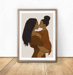 an art print of two women kissing each other in front of a wooden frame on a wall