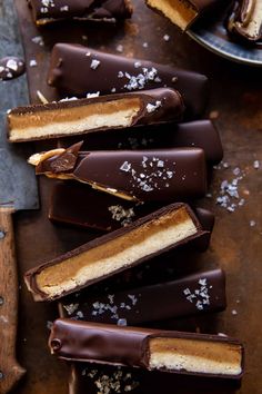 several pieces of chocolate and marshmallows on a table