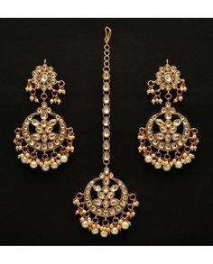 Earring Length: 8.80 CM x Width: 4.50 CM \nMaang Tikka Length: 16.00 CM x Width: 4.50 CM \nMetal: Alloy With Good Quality Gold Plated \nColor: White | Stone: Imitation Pearl & Kundan \nGross Weight: 55.00 Grams \nPackage Content: 1 Pairs Of Earrings::1 Piece Of Maang Tikka \nBack Finding: Post With Friction Back x Earring Style: Dangle \nCare Instruction : Avoid Heat & Chemicals Like Perfume, Deo, Alchol, Etc. | #white#earring#2022#newyear#trendingset White Earring, Kundan Work, Baby Pearls, Jhumki Earrings, Maang Tikka